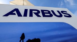The-logo-of-European-multinational-aerospace-corporation-Airbus-SE-is-pictured-during-the-2023-Dubai-Airshow.jpg