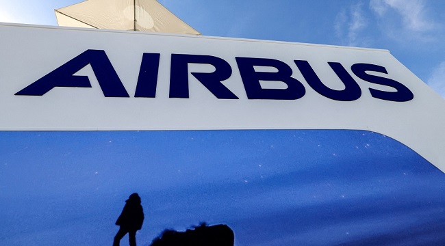 The-logo-of-European-multinational-aerospace-corporation-Airbus-SE-is-pictured-during-the-2023-Dubai-Airshow.jpg